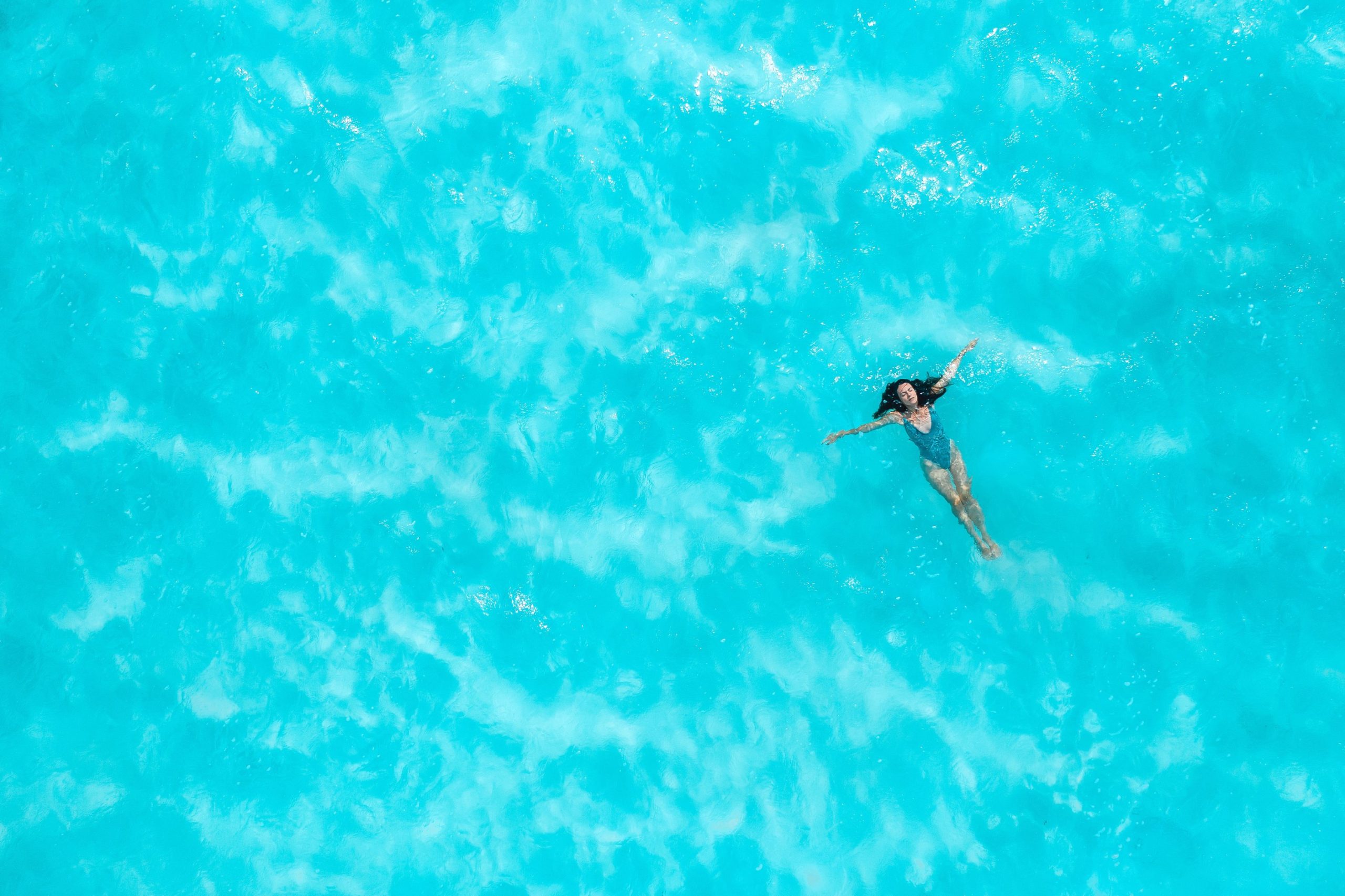 A woman floating in the ocean